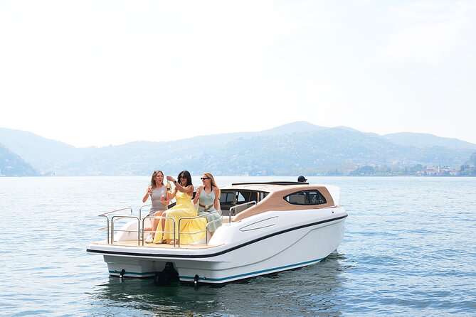 7-11 Guests Luxury Limousine Boat Private Tour of Lake Como - Como to Cernobbio: grand façades from the lake