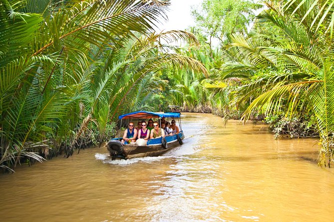 Cu Chi Tunnels & Mekong Delta Tour with VIP Limousine Transfer - Lunch and the road toward My Tho