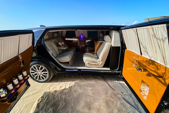 Deluxe GMC Limousine from CUN Airport to Cancun Hotel Zone - Drinks, coffee, and the fine print