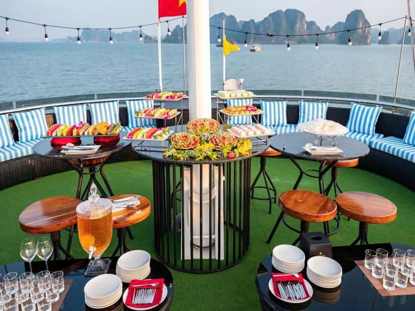 Ha Long Bay Cruise w/ Jacuzzi, Kayak & Limo from Hanoi - Kayaking or bamboo boating through Luon Cave