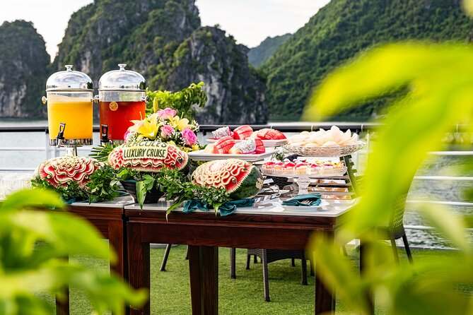 Halong Bay Luxury cruise Day trip: Buffet Lunch, Limousine bus - Sunset drinks and the ride back to Hanoi