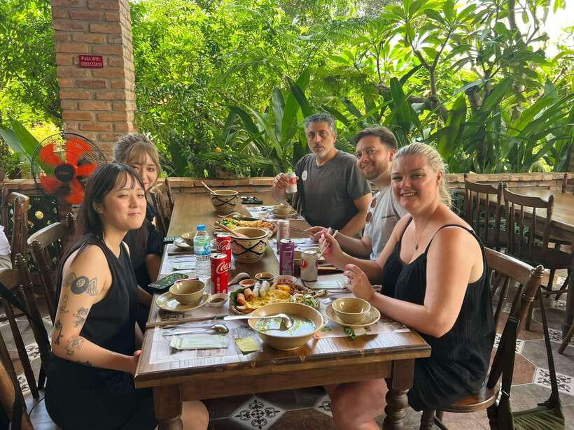 HCMC: Cu Chi Tunnels & Mekong Delta VIP Tour by Limousine - Fruit, honey, local products, and music