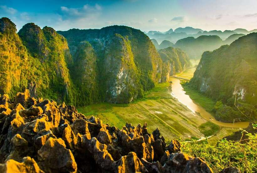 Hoa Lu, Tam Coc, & Mua Cave Day Trip with Lunch & Limousine - A short bicycle ride through local life