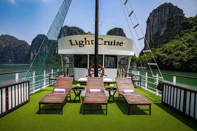 Light Cruise - Luxury Halong Day Cruise ( Limousine - Expressway - Small Group) - Titov Island for swimming and the summit view