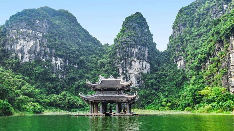 Ninh Binh: Hoa Lu Mua Cave Trang An on Limousine and Cycling - Cycling through Hoa Lu’s royal past