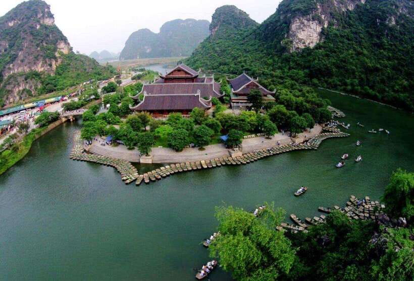 Ninh Binh: Hoa Lu Mua Cave Trang An on Limousine and Cycling - Trang An by long-tail boat