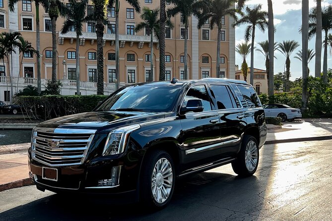 Private SUV Limo Services in Miami FL - Riding in the black Cadillac Escalade Platinum